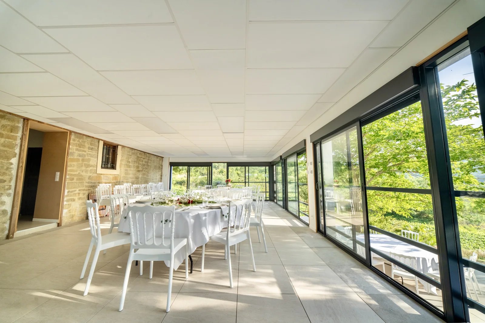 The reception room opening onto the garden