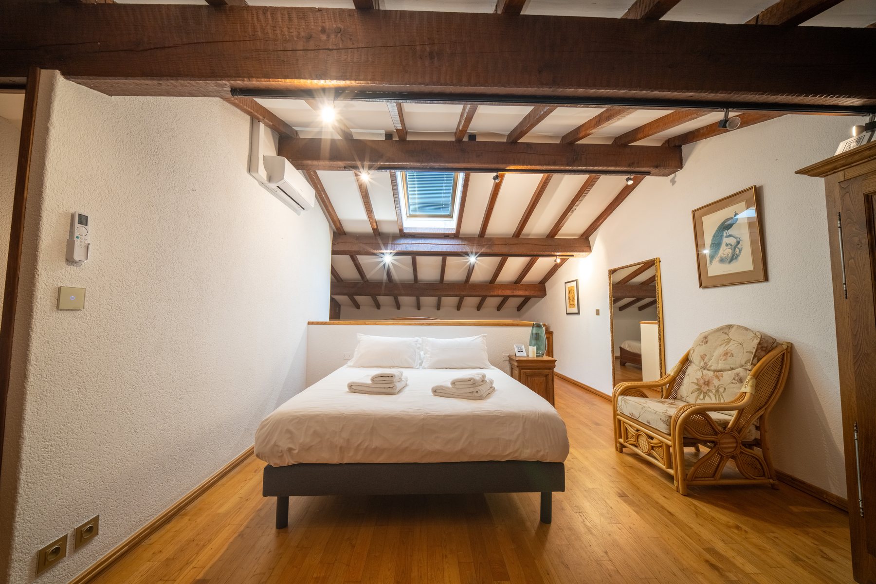 Family Room at Ch&acirc;teau de Tournou with sleeping spaces under exposed beams